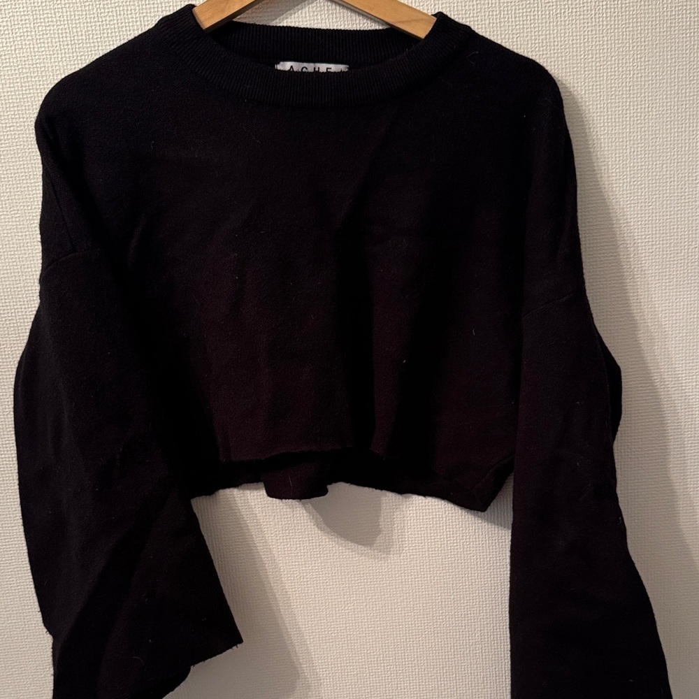 Elegant Black Cropped Sweater by [Brand]